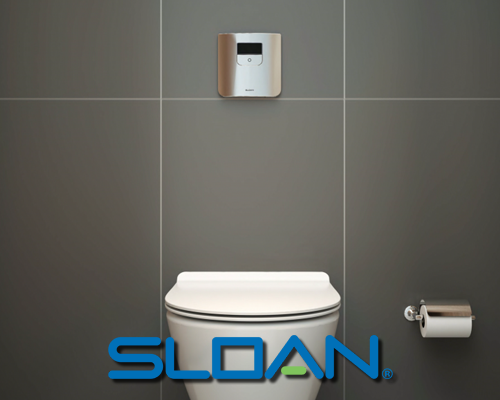 Bathroom showcasing white color WC with Sensor flush valve from Sloan, on grey color tiled wall.