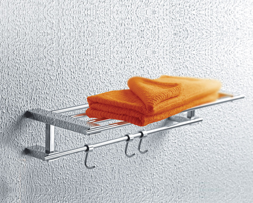 towel hanger on a white color wall with shiny chrome finish